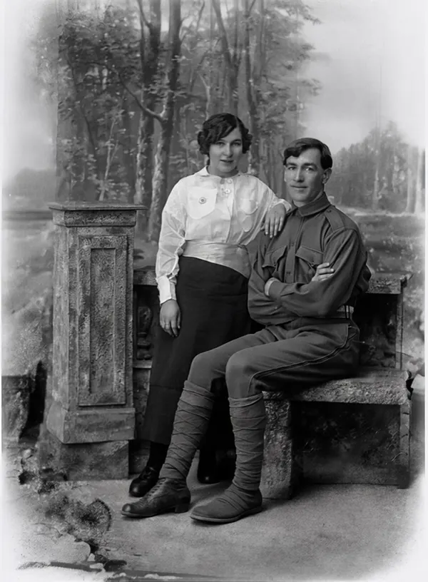 The same old photo after AI photo restoration, with stains and missing corners repaired